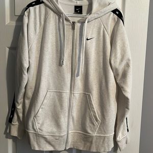 Nike cream coloured zipper hoodie. Size M. Side slits. Barely worn, like new.